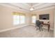 Spacious bedroom with trey ceiling, large windows, and neutral carpet at 5053 Chapel Xing, Douglasville, GA 30135