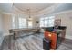 Entertain with a game room featuring a shuffleboard table, and a wet bar at 5053 Chapel Xing, Douglasville, GA 30135