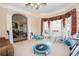 Bright playroom filled with toys and natural light streaming through large windows at 5053 Chapel Xing, Douglasville, GA 30135