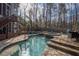 Beautiful backyard pool and patio area, perfect for outdoor entertaining and relaxation at 5053 Chapel Xing, Douglasville, GA 30135