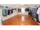 Expansive walk-in closet with custom shelving and hanging rods for maximum storage at 5053 Chapel Xing, Douglasville, GA 30135