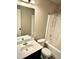 Bathroom featuring a vanity with sink and a bathtub with shower at 611 Winners Cir, Locust Grove, GA 30248