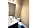 Bathroom with a white sink and modern toilet for your convenience at 611 Winners Cir, Locust Grove, GA 30248