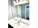 Bathroom featuring double sink and a glass-doored shower at 611 Winners Cir, Locust Grove, GA 30248