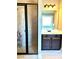 Modern bathroom featuring glass-door shower, sink and vanity at 611 Winners Cir, Locust Grove, GA 30248