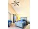 Cozy bedroom with vaulted ceiling, a comfortable bed and soft lighting at 611 Winners Cir, Locust Grove, GA 30248