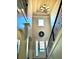 Bright entryway with decorative trim, wreath, and chandelier at 611 Winners Cir, Locust Grove, GA 30248