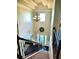 Grand two-story foyer with stairs and decorative chandelier at 611 Winners Cir, Locust Grove, GA 30248