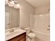 Bathroom with vanity, toilet, and shower with tub at 656 Sunset Park Dr, Suwanee, GA 30024