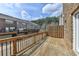 Deck with wood railings and a view of the surrounding area at 656 Sunset Park Dr, Suwanee, GA 30024