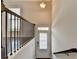 Well-lit entryway with stairs, wood floors and a white front door at 656 Sunset Park Dr, Suwanee, GA 30024