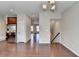 Kitchen leading to other rooms featuring stainless steel appliances and hardwood floors at 656 Sunset Park Dr, Suwanee, GA 30024