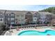 Community pool and lounge area offers an inviting space to relax and socialize at 656 Sunset Park Dr, Suwanee, GA 30024