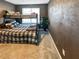 This bedroom has a bunk bed, window, textured wall, and a carpeted floor at 217 Odyssey Turn Nw, Conyers, GA 30012