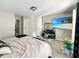 This main bedroom offers a TV, carpeted floor, white walls, and natural light at 217 Odyssey Turn Nw, Conyers, GA 30012