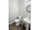Cozy powder room featuring modern fixtures and stylish vanity at 217 Odyssey Turn Nw, Conyers, GA 30012