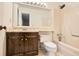 Bathroom with a wooden vanity and a shower-tub combo at 4716 Habersham Sw Rdg, Lilburn, GA 30047