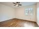 Bedroom features hardwood floors, a ceiling fan and natural light at 4716 Habersham Sw Rdg, Lilburn, GA 30047