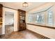 Charming dining area features a large bay window and beautiful brick flooring at 4716 Habersham Sw Rdg, Lilburn, GA 30047