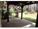 Relaxing back porch with overhead fan offers a comfortable spot to enjoy the outdoors at 1313 Idlewood Ct, Mcdonough, GA 30252