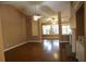 Spacious living room featuring hardwood floors, large windows, and a cozy atmosphere for entertaining or relaxing at 1313 Idlewood Ct, Mcdonough, GA 30252