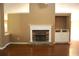 Bright and airy living room featuring a stone fireplace and hardwood floors, perfect for Gathering gatherings at 1313 Idlewood Ct, Mcdonough, GA 30252