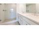 Beautiful bathroom with dual sinks, white cabinets, and a glass-enclosed shower at 1923 Deco Dr, Kennesaw, GA 30144