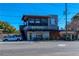Two-story restaurant with an outdoor dining area and modern architectural design at 1923 Deco Dr, Kennesaw, GA 30144