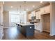 Bright kitchen features stainless steel appliances, a large island, and pendant lighting at 1923 Deco Dr, Kennesaw, GA 30144