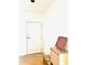 Inviting entryway features hardwood floors, a shoe rack, and a decorative sign at 325 E Paces Ferry Ne Rd # 1606, Atlanta, GA 30305
