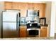 Updated kitchen featuring modern appliances and granite countertops at 325 E Paces Ferry Ne Rd # 1606, Atlanta, GA 30305