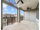 A large balcony with black metal railings and a ceiling fan offers great views of the surrounding neighborhood at 513 Broadview Ln, Atlanta, GA 30324