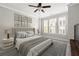 Stylishly furnished bedroom with carpet, a ceiling fan, and bright windows offering ample natural light at 513 Broadview Ln, Atlanta, GA 30324