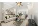 Cozy living room featuring hardwood floors, a comfortable sofa, and stylish decor at 513 Broadview Ln, Atlanta, GA 30324