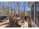Open back deck with room for outdoor seating and barbecue with view to sunroom at 3016 Ansley Manor Ct, Snellville, GA 30078