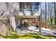 Spacious backyard with covered patio and outdoor seating area at 3016 Ansley Manor Ct, Snellville, GA 30078