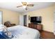 Inviting bedroom features a large bed, natural light, and an accent chair at 3016 Ansley Manor Ct, Snellville, GA 30078