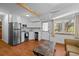 Efficient kitchen area with stainless steel appliances and white cabinets at 3016 Ansley Manor Ct, Snellville, GA 30078