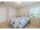 Bedroom featuring carpet, two side tables, and a double bed at 5711 Keys Way, Lithonia, GA 30058