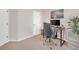 Bedroom with carpet, neutral walls, and black desk at 5711 Keys Way, Lithonia, GA 30058
