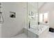 Modern bathroom with a soaking tub, a glass-enclosed shower, and beautiful tiling and finishes at 1230 Newbridge Ne Trce, Brookhaven, GA 30319