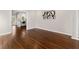 The bright dining area has hardwood floors adjacent to the open kitchen at 1230 Newbridge Ne Trce, Brookhaven, GA 30319