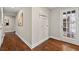 Laundry area with hardwood floors, modern paint, and a door leading to the outside at 1230 Newbridge Ne Trce, Brookhaven, GA 30319