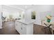 Bright kitchen with granite countertops, stainless appliances and open floor plan to living room at 1321 Bridges Sw Ave, Atlanta, GA 30310