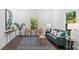Bright living room with modern decor, featuring hardwood floors and plenty of natural light at 1321 Bridges Sw Ave, Atlanta, GA 30310