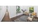 Bright living room with modern decor, featuring hardwood floors and plenty of natural light at 1321 Bridges Sw Ave, Atlanta, GA 30310