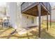 Back of house, showing access door, part of deck, and exterior at 2149 Shoals Way, Decatur, GA 30034
