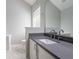 Modern bathroom featuring a vanity with gray countertop and white cabinets at 2149 Shoals Way, Decatur, GA 30034