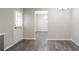 Bright dining room with hardwood floors and neutral paint, perfect for entertaining guests at 2149 Shoals Way, Decatur, GA 30034