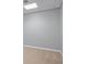 Basement with neutral carpeting and a suspended ceiling with recessed lighting at 2393 Strand Ave, Lawrenceville, GA 30043